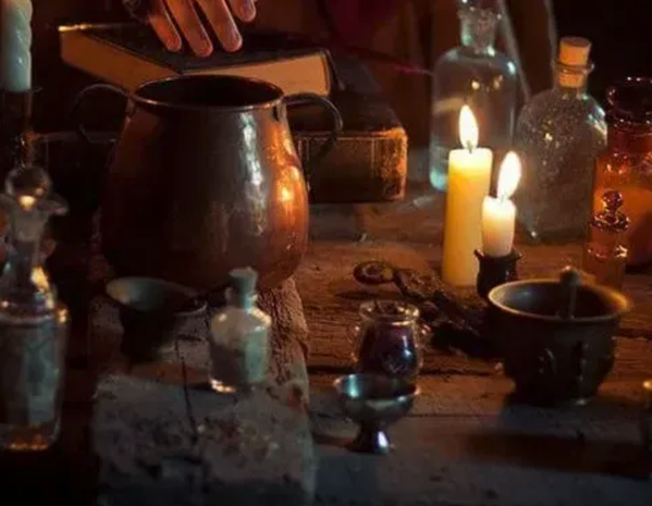 WHAT IS THE ALCHEMIST BREWING IN HIS LAB?